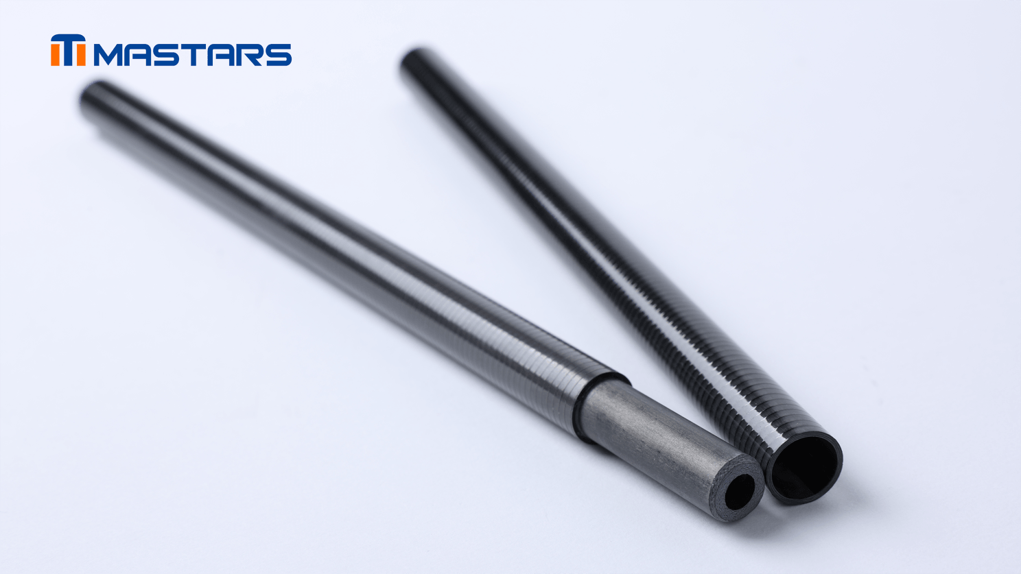 Carbon fiber nested tube detail with machined surface texture Carbon fiber nested tube detail with machined surface texture
