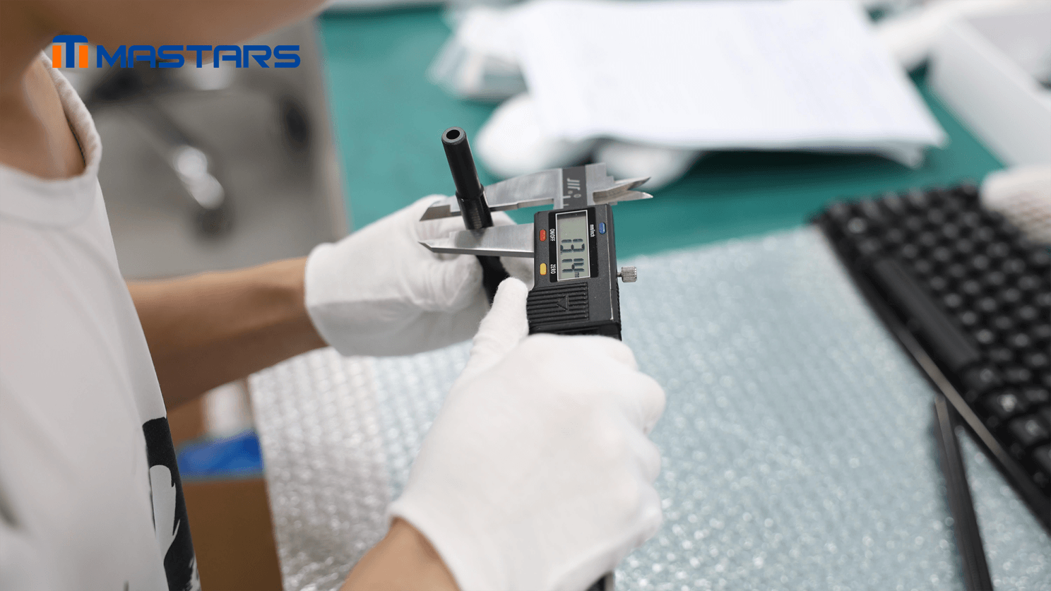 A Mastar's engineer checks key dimensions to ensure a stable nested fit A Mastar's engineer checks key dimensions to ensure a stable nested fit