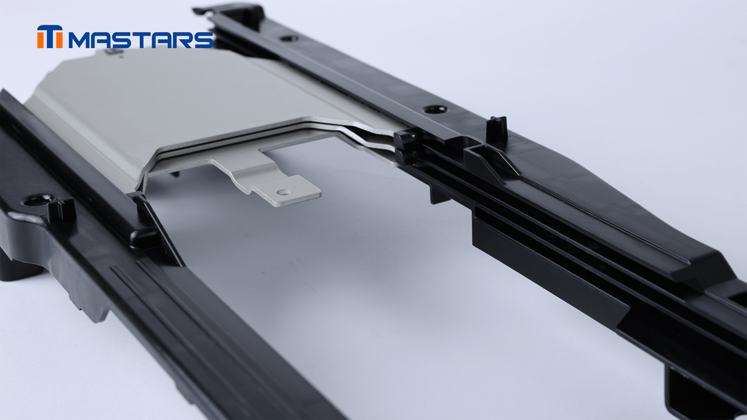 The molded automotive rail housing features a long guide channel that must remain sufficiently straight for smooth sliding. The molded automotive rail housing features a long guide channel that must remain sufficiently straight for smooth sliding.