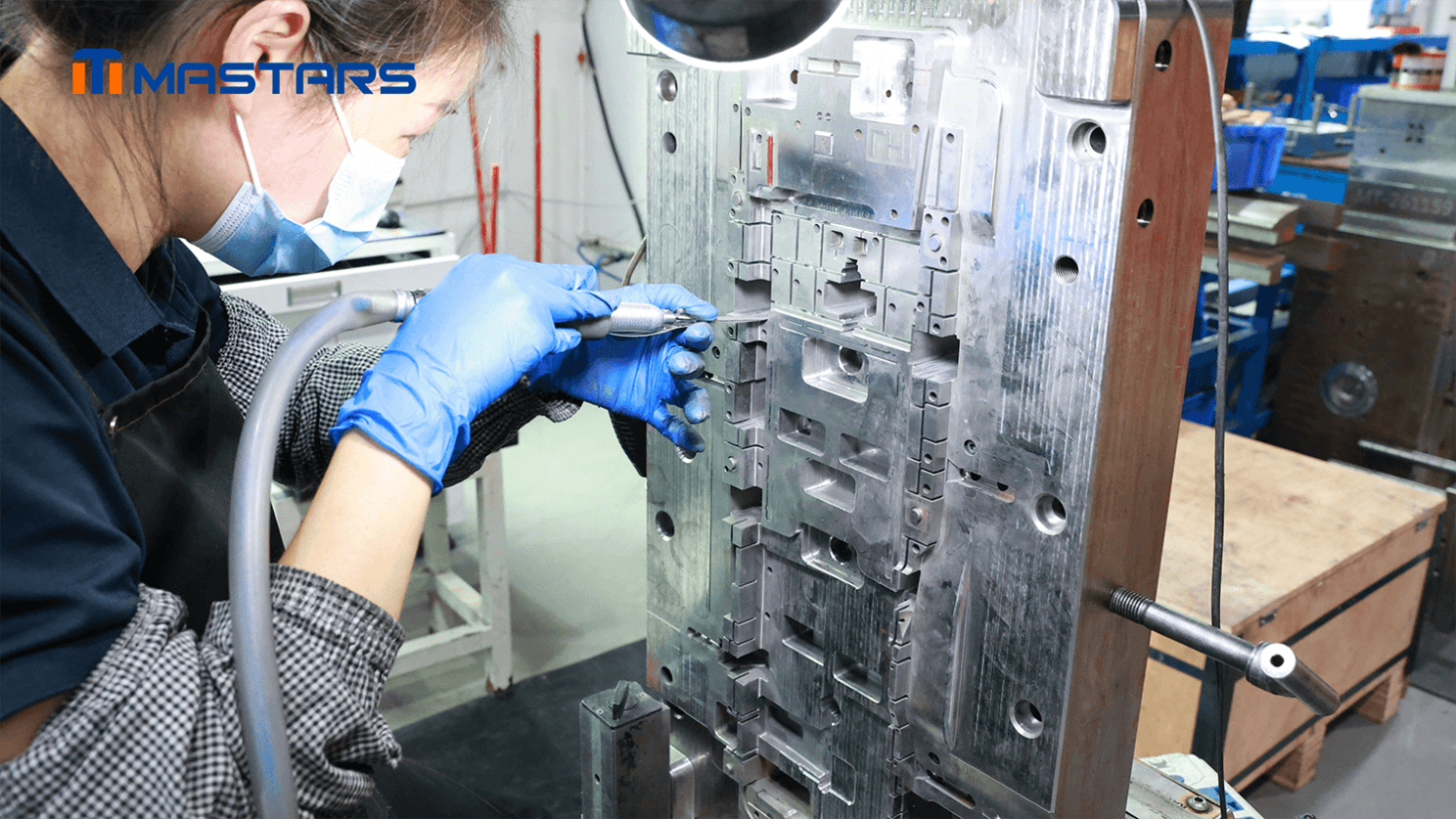 A Mastars technician works on the mold, making fitting adjustments and refining the surface in preparation for product validation. A Mastars technician works on the mold, making fitting adjustments and refining the surface in preparation for product validation.