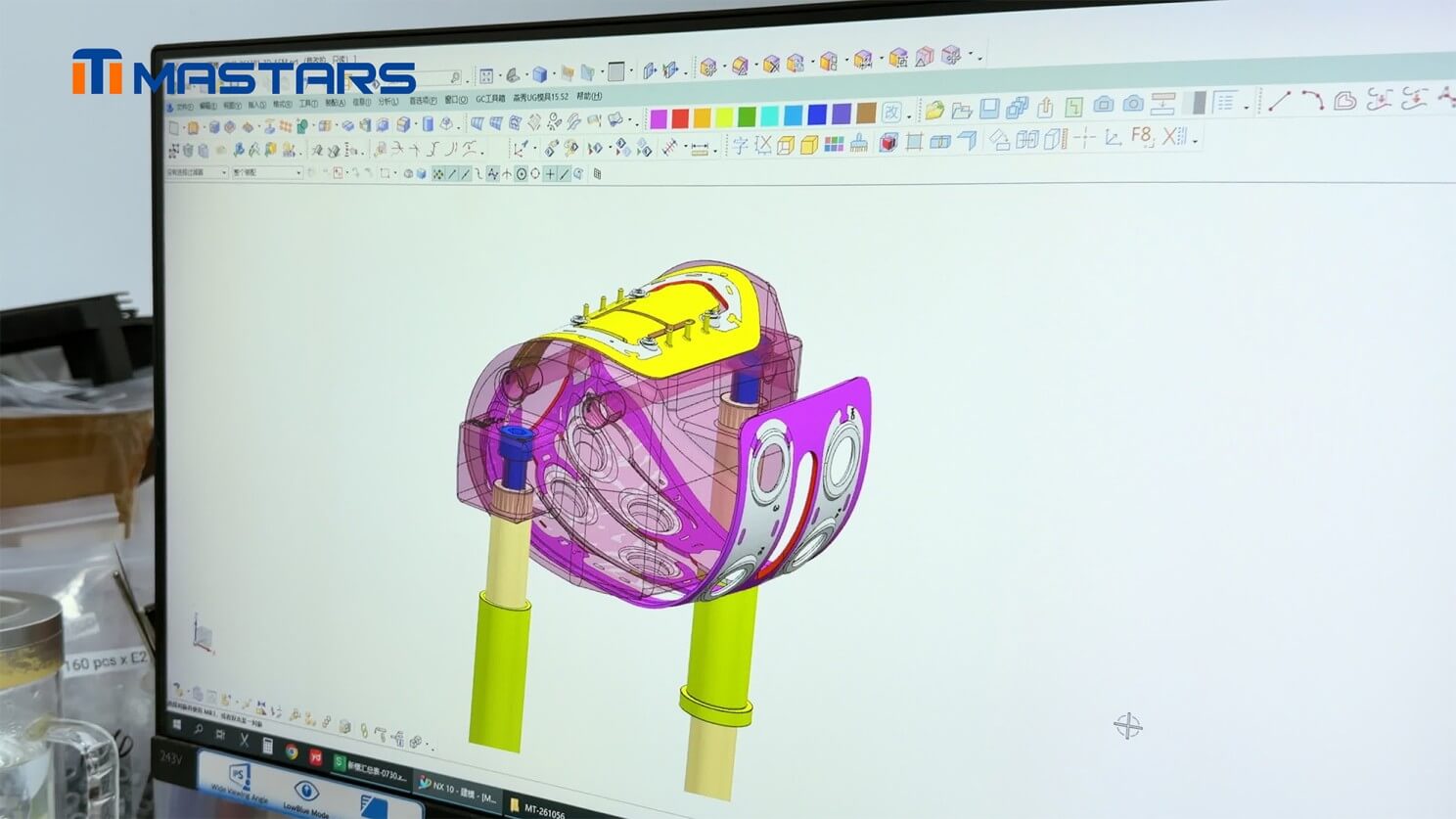 Tooling is engineered around the curved geometry and staged overmolding process. Tooling is engineered around the curved geometry and staged overmolding process.