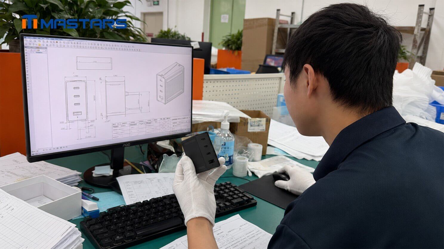 Quality inspection compares the enclosure against its 2D drawing.