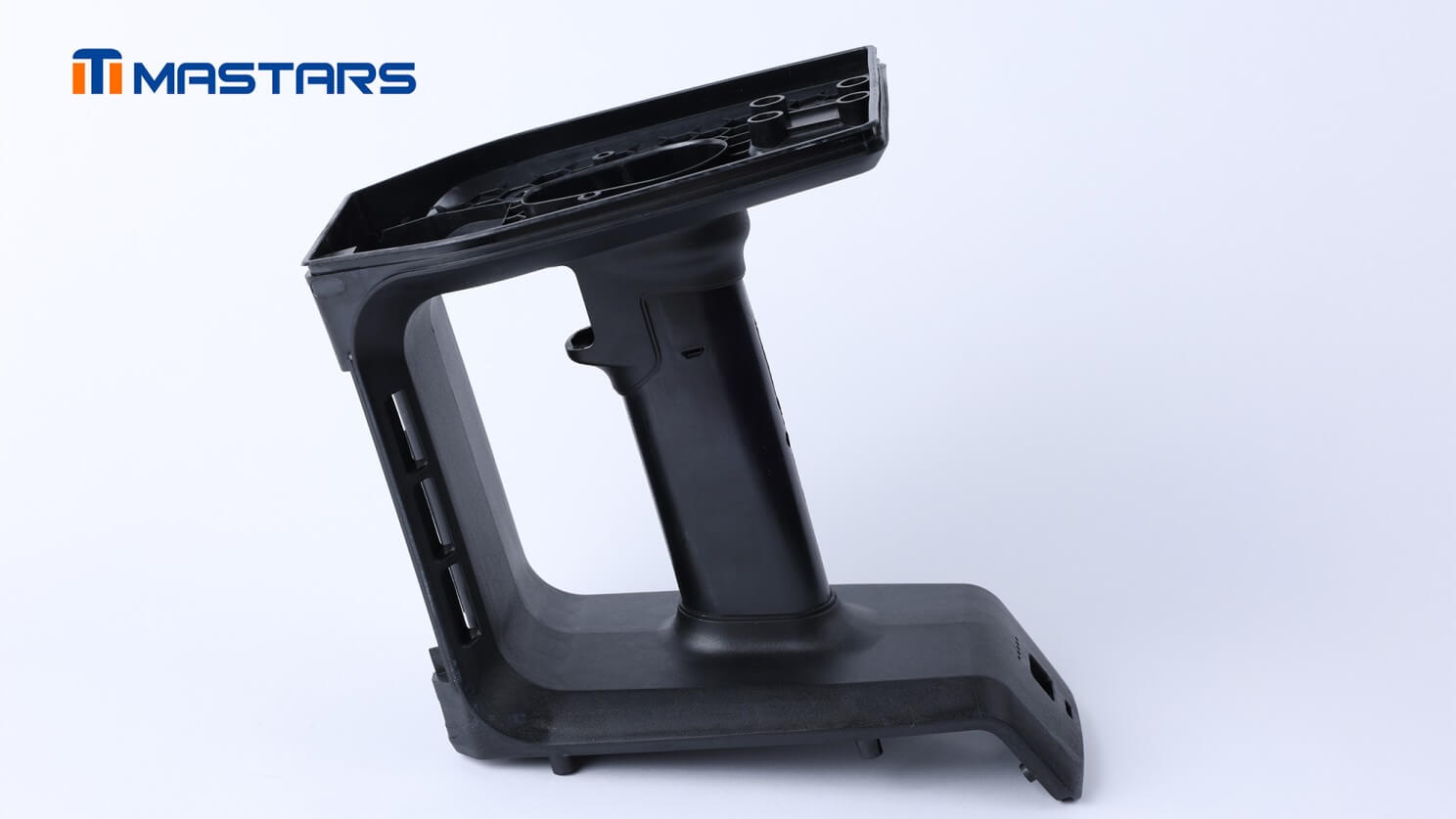 PBT+20CF handle housing integrating grip, frame, and assembly interfaces. PBT+20CF handle housing integrating grip, frame, and assembly interfaces.