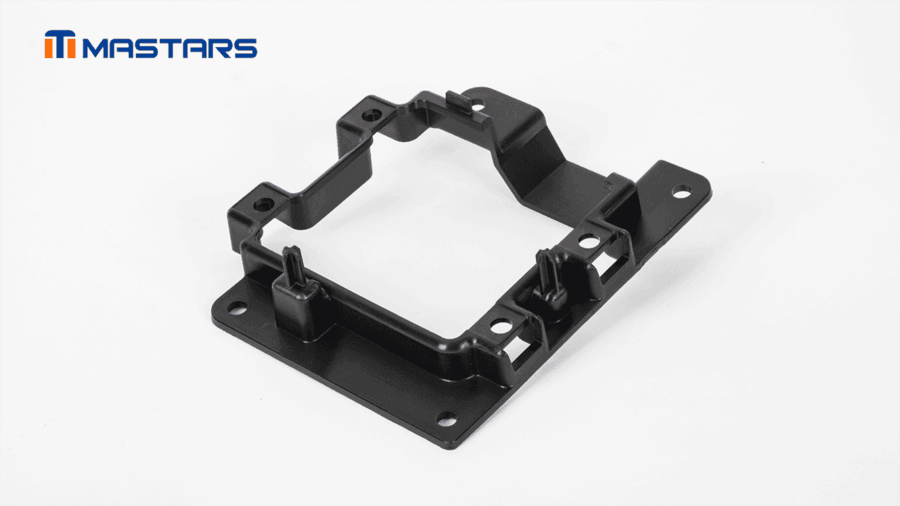 PA6-GF30 camera mounting bracket featuring multiple mounting holes, locating pins, and support features.