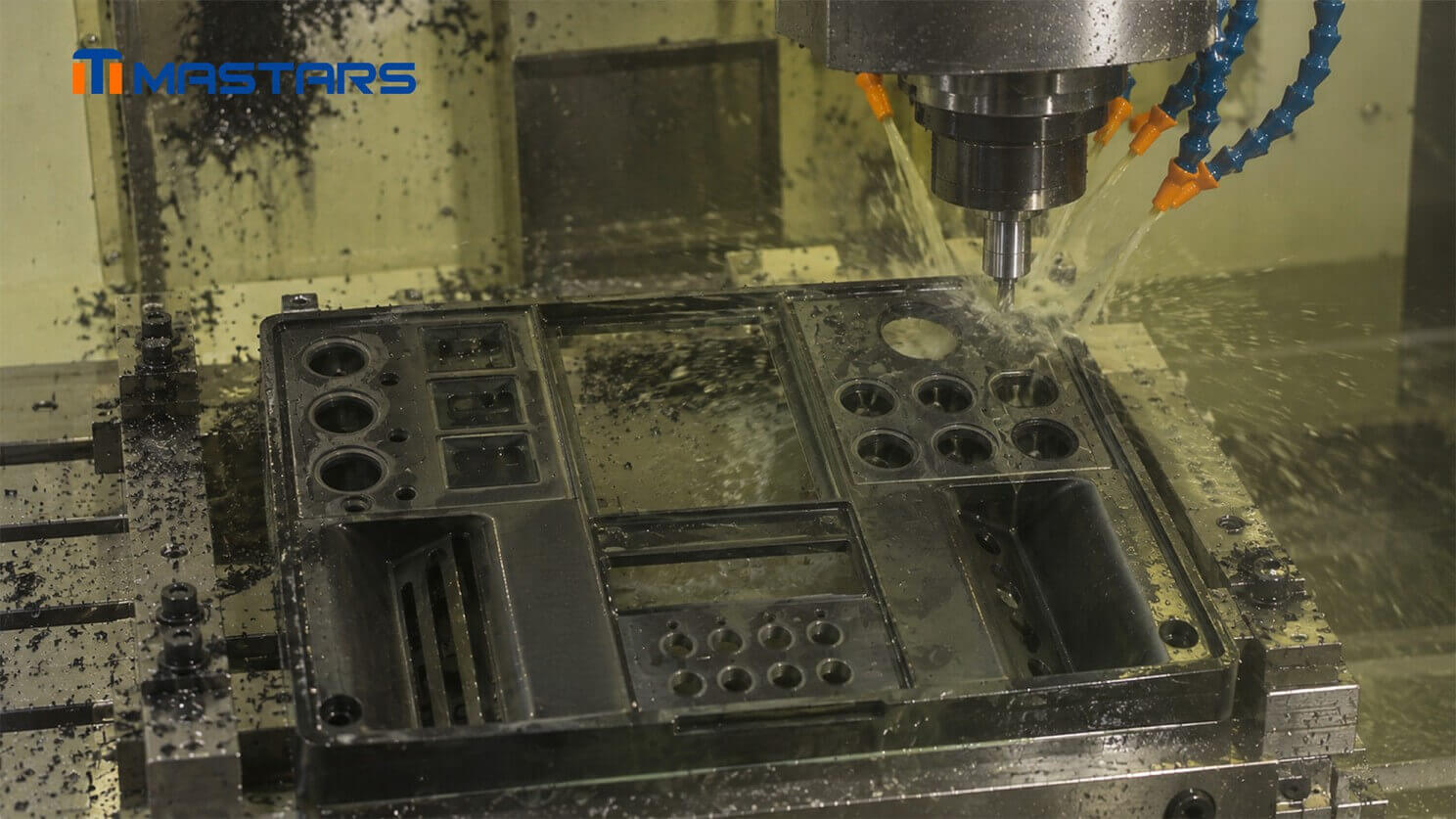 CNC milling process for the plastic control panel, shaping complex features before surface finishing.