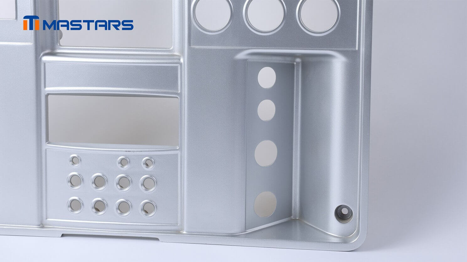 Detailed view of the finished panel’s precision openings, recessed geometry, and metallic appearance.