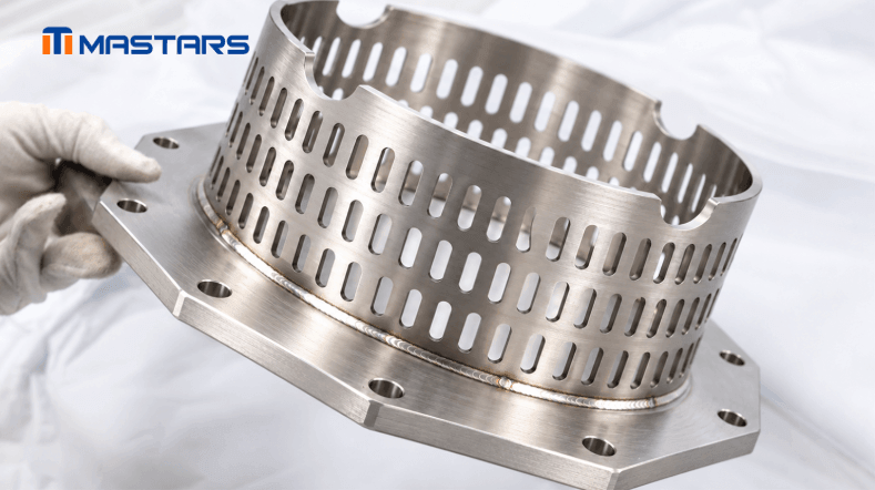 The completed assembly combines a perforated stainless steel cylinder with a CNC-machined mounting flange. The completed assembly combines a perforated stainless steel cylinder with a CNC-machined mounting flange.